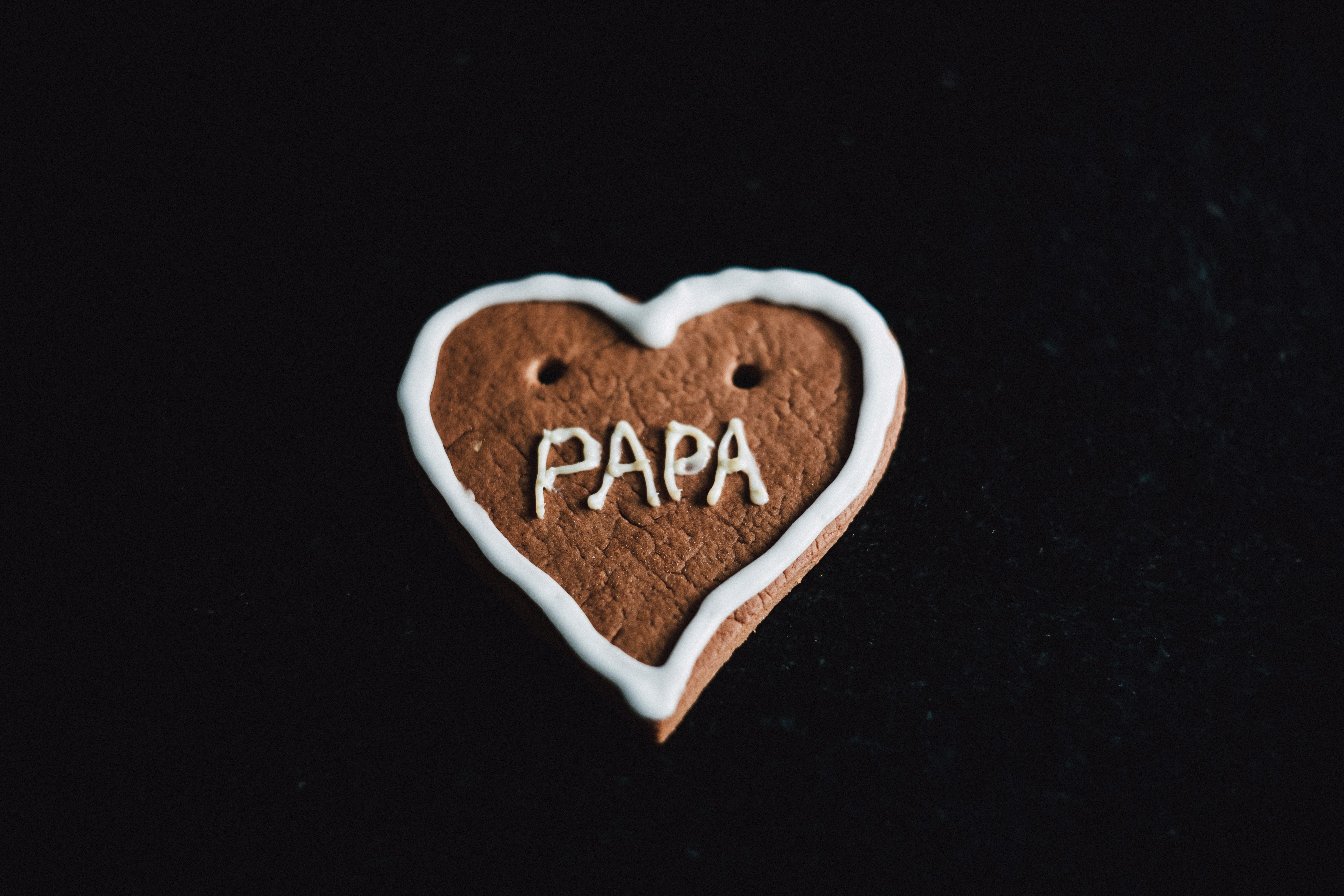 heart-shaped cookie with papa decoration